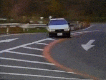 AE86 drifting over a japanese mountain